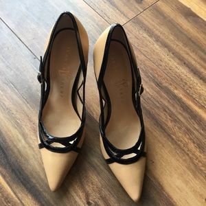 Nude and black pumps